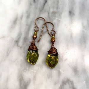 Beautiful,  artisan made, boho green leaf earrings.